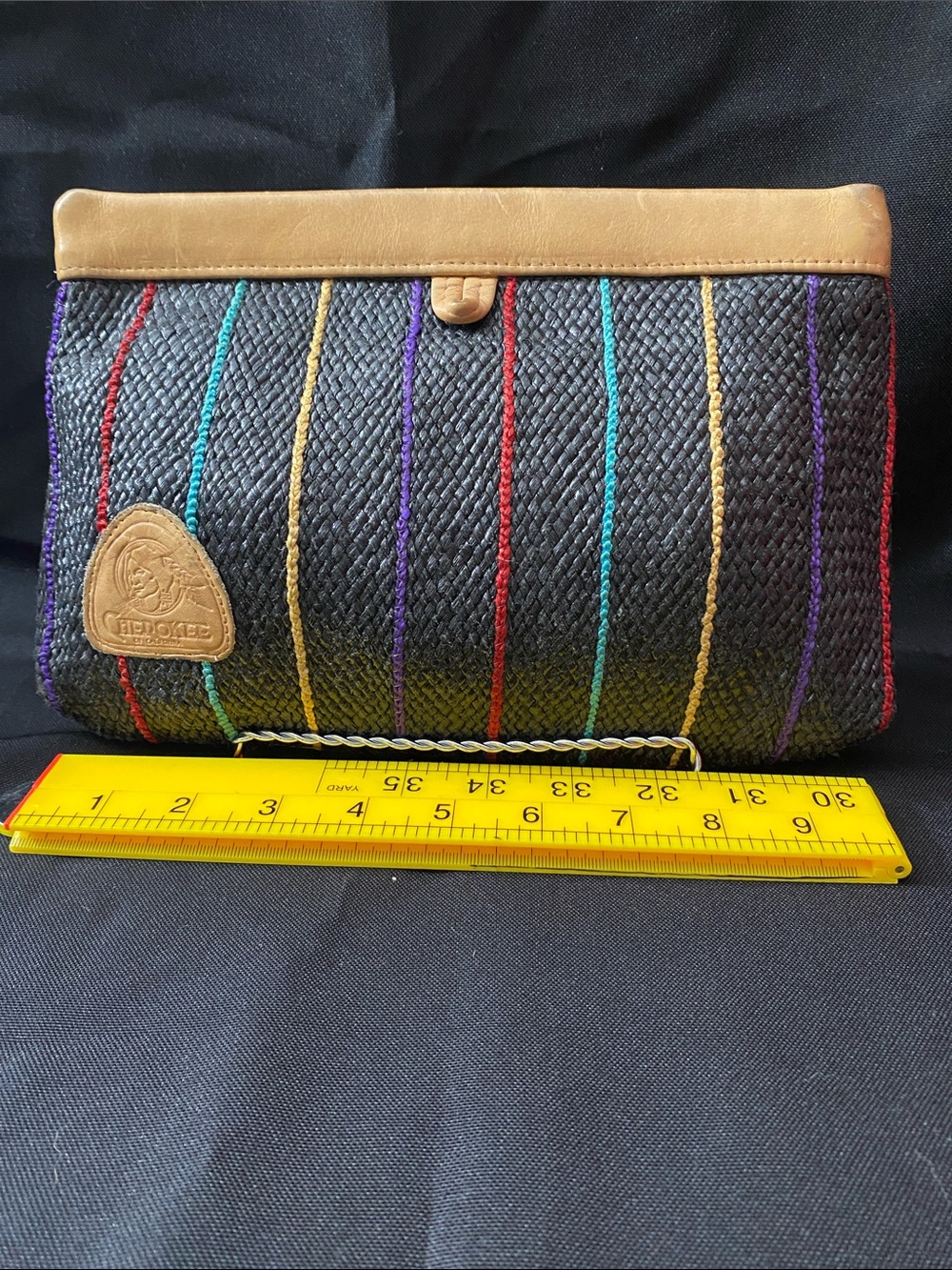 Cherokee Black Woven Clutch with Red and Teal Accents